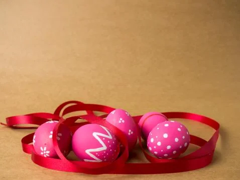 Easter eggs on the brown background. Stock Photos