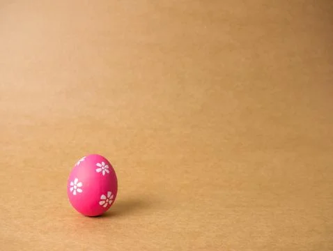 Easter eggs on the brown background. Stock Photos