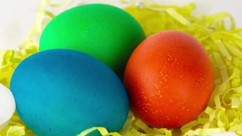 Easter eggs in brown bowl. Happy Easter holiday. Colorful painted eggs. Bright Stock Footage 174709673