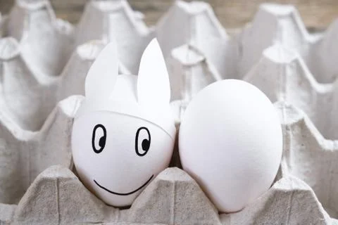 Easter eggs with bunny ears in the pack Stock Photos