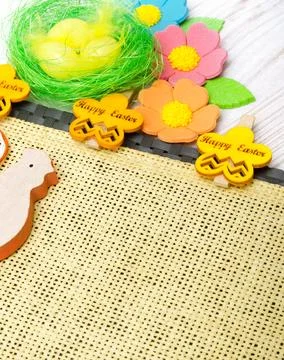 Easter eggs on a burlap background. Easter decoration. Stock Photos