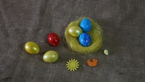 Easter eggs on burlap background Video stock 87644150
