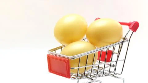 Easter eggs in cart for gift Stock Photos