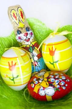 Easter Eggs with Chocolate Bunny Vertical Stock Photos