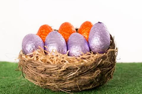 Easter eggs chocolate on grass Stock Photos