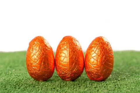 Easter eggs chocolate on grass Stock Photos