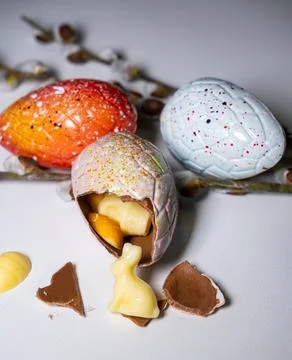 Easter eggs with chocolate with a surprise inside Stock Photos