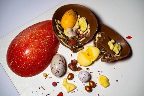 Easter eggs with chocolate with a surprise inside Stock Photos