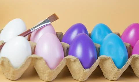 Easter eggs close up and Paint brushes Stock Photos