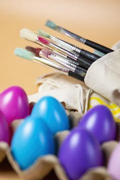 Easter eggs close up and Paint brushes Stock Photos