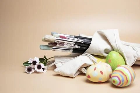 Easter eggs close up and Paint brushes Stock Photos