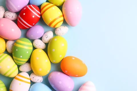 Easter eggs on a colored background, festive background Stock Photos
