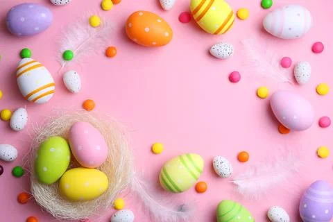 Easter eggs on a colored background, festive background Stock Photos