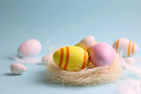 Easter eggs on a colored background, festive background Stock Photos