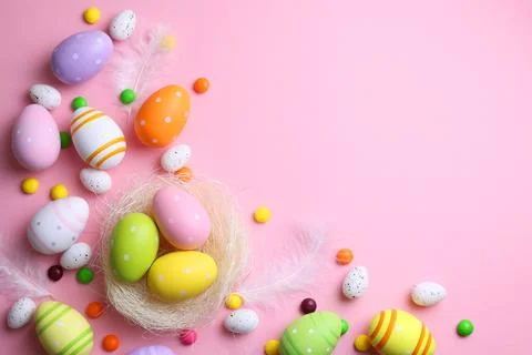 Easter eggs on a colored background, festive background Stock Photos