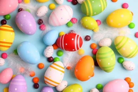 Easter eggs on a colored background, festive background Stock Photos