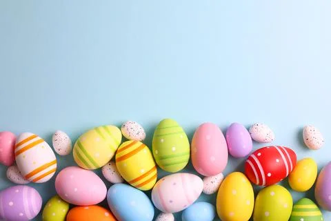 Easter eggs on a colored background, festive background Stock Photos