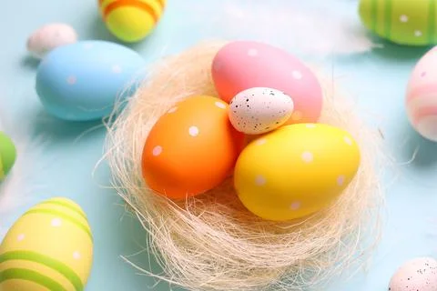 Easter eggs on a colored background, festive background Foto stock