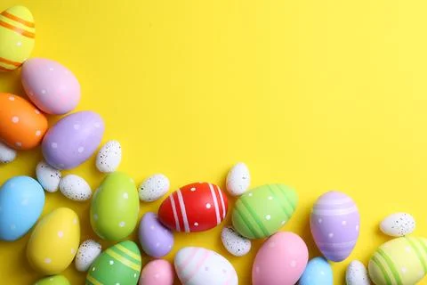 Easter eggs on a colored background, festive background Stock Photos