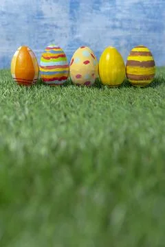 Easter eggs colored on grass  side view. Stock Photos