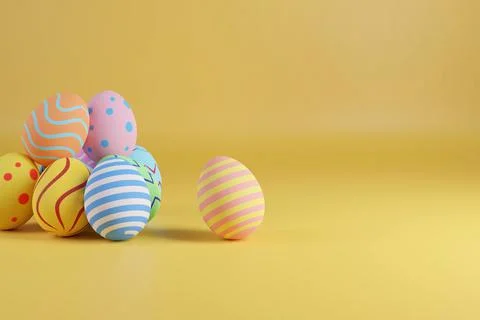 Easter eggs with copy space on yellow background. 3d illustration. Stock Photos