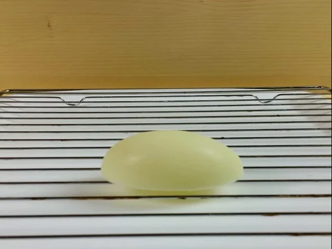 Easter eggs covered with melted chocolate Stock Footage 74464433