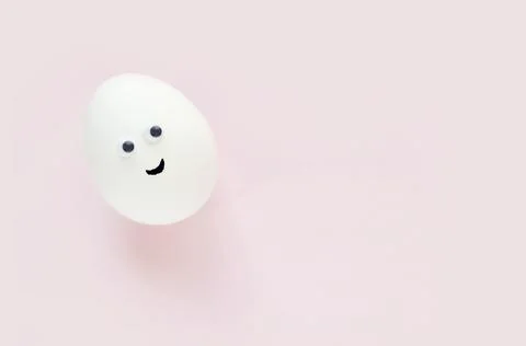 Easter eggs creative flat lay on pink background. Minimal concept. Stock Photos