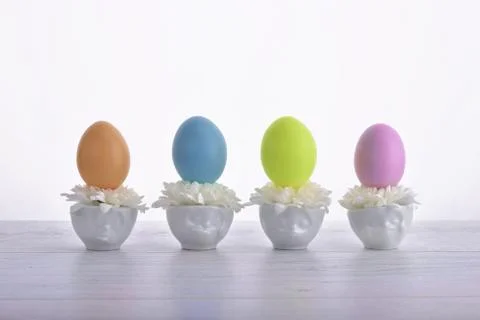 Easter eggs in cute cups 스톡 사진