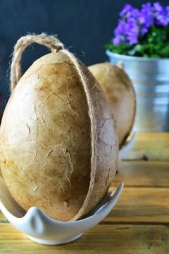 Easter eggs decorated by decoupage technique on wooden desk. 写真素材