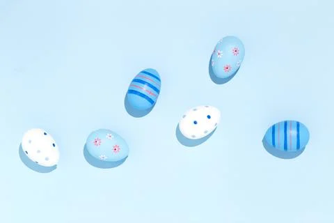 Easter eggs decorated painted minimal abstract concept sunny day Stock Photos