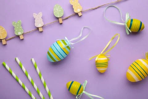 Easter eggs with decoration on purple background Stock Photos