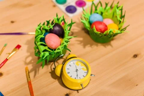 Easter eggs of different bright colors with  brushes and multicolor paints Stock Photos