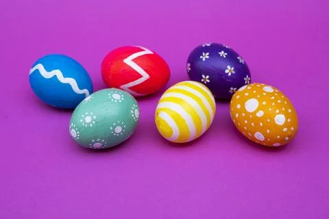 Easter Eggs With Dotted Patterns On Light Pink Backdrop Stock Photos