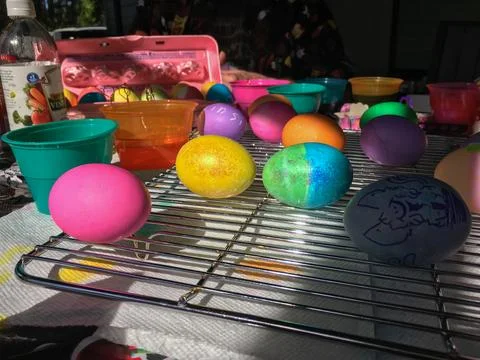 Easter Eggs Dyed and Drying on a Cooling Rack Stock Photos