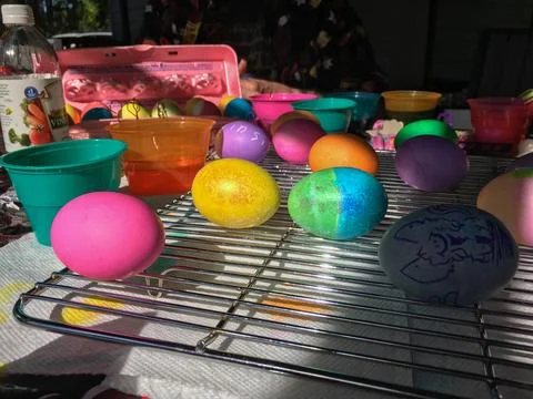 Easter Eggs Dyed and Drying on a Cooling Rack Stock Photos