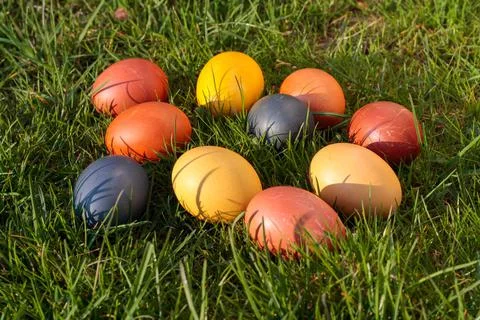 Easter eggs, dyed chicken eggs in the grass Stock Photos