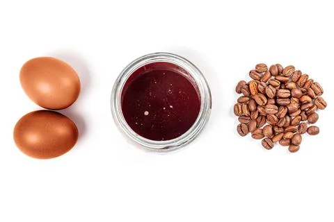 Easter eggs dyeing with coffee, top view Stock Photos