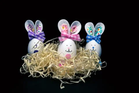 Easter eggs. Easter bunny in wood shavings. Easter symbolism Stock Photos