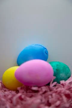 Easter Eggs In Easter Grass Stock Photos