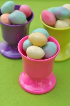 Easter eggs in eggcups Stock Photos