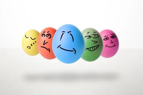 Easter eggs with emoticons Stock Photos