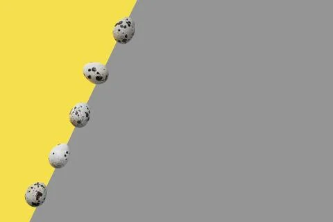 Easter eggs on the flat background yellow and gray colors Stock Photos