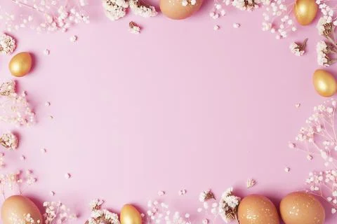 Easter eggs with flowers on pink background. Flat lay, copy space. beautiful Stock Photos