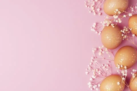Easter eggs with flowers on pink background. Flat lay, copy space. beautiful Stock Photos