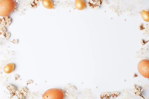 Easter eggs with flowers on white background. Flat lay, copy space. beautiful Stock Photos