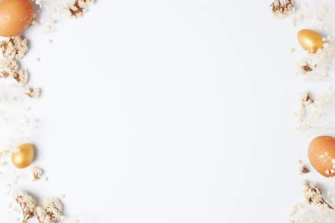 Easter eggs with flowers on white background. Flat lay, copy space. beautiful Stock Photos