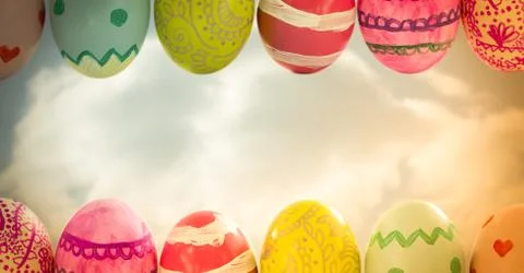 Easter eggs in front of cloudy sky Stock Fotos