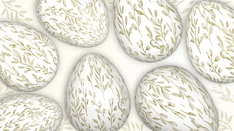Easter eggs with golden painted patterns. Animated holiday seamless background. Stock Footage 234994450