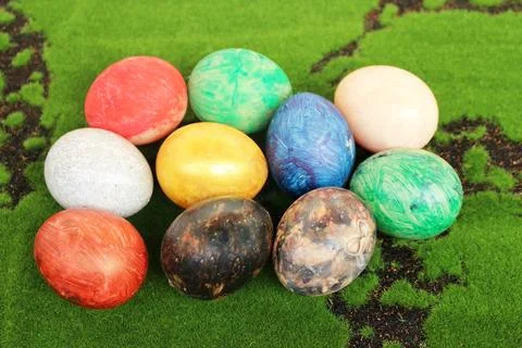 Easter eggs on grass background with space Stock Photos