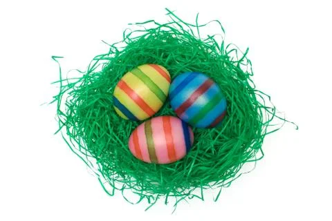 Easter Eggs on Grass Isolated on a White Background Photos